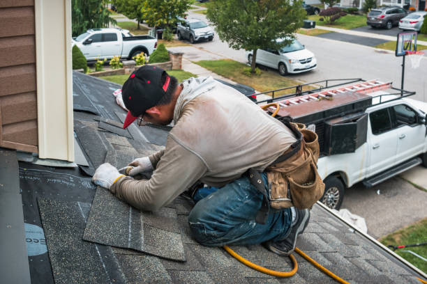 Professional Emergency Roof Repair technician working in Brentwood, NY